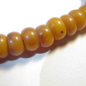 LONG STRAND OF GORGEOUS BUTTERSCOTCH AMBER BEADS.